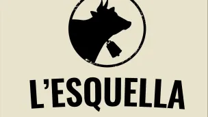 Silhouette of a cow's head inside a circle, with text "L'Esquella" below.